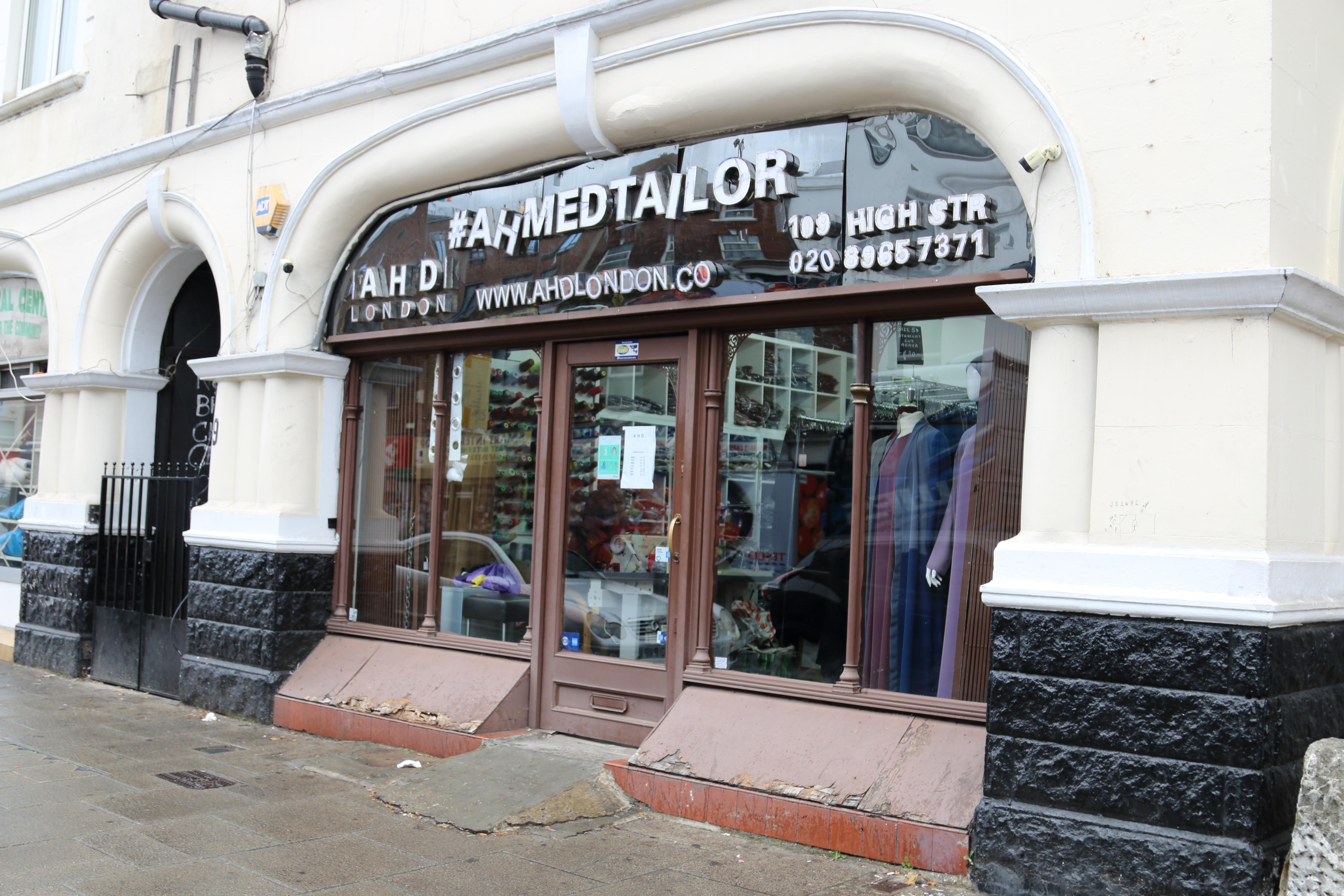 Colour image showing the shopfront of Ahmed Tailors in Harlesden.
